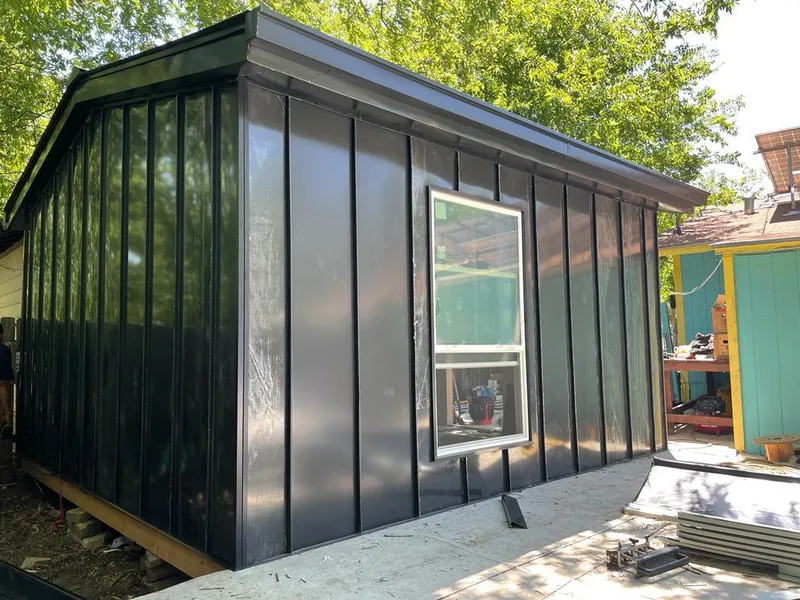 Black standing seam metal wall panels for Roof Inspection in Layhill